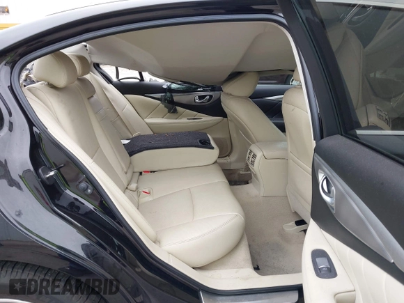 2015 Infiniti Q50 Premium with VIN JN1BV7AR8FM396828, listed as a IAAI auction lot 42313019 with 130,707 mi miles and . Bid and sale history available at DreamBid. Image 8.