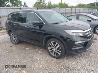 2016 Honda Pilot Touring with VIN 5FNYF5H91GB046742, listed as a IAAI auction lot 42333521 with 152,116 mi miles and . Bid and sale history available at DreamBid. Image 1.