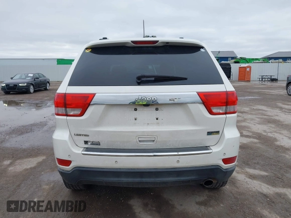 2012 Jeep Grand Cherokee Limited with VIN 1C4RJEBG4CC229571, listed as a IAAI auction lot 41565669 with 221,268 mi miles. Bid and sale history available at carsss.com. Image 16.