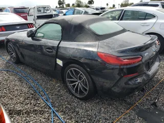 2022 BMW Z4 sDrive30i with VIN WBAHF3C04NWX42062, listed as a Copart auction lot 74989854 with 0 mi miles and Salvage Title. Bid and sale history available at carsss.com. Image 2.