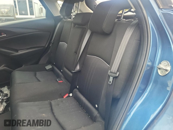 2019 Mazda CX-3 Touring z VIN JM1DKFC78K0414606, wystawiony jako Copart lot #56095515 z przebiegiem Nie podano mil oraz Szkoda całkowita • Salvage title. Historia ofert i sprzedaży dostępna na DreamBid. Obrazek 11.