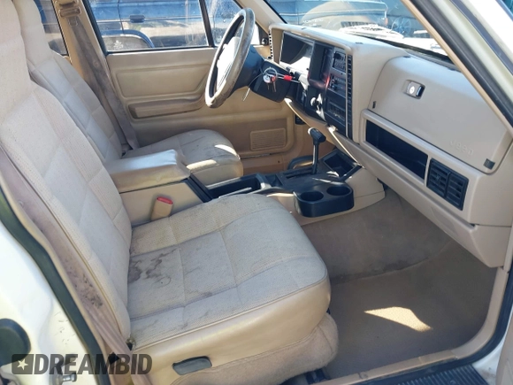 1996 Jeep Cherokee Sport with VIN 1J4FJ68S9TL234764, listed as a IAAI auction lot 41636731 with 129,732 mi miles. Bid and sale history available at carsss.com. Image 5.