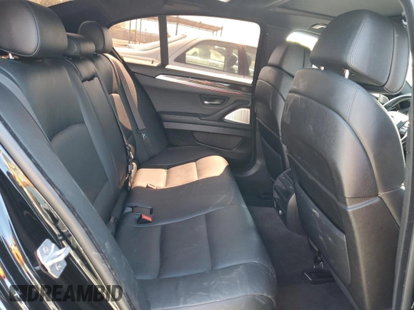 2013 BMW 5 Series 550i xDrive z VIN WBAFU9C54DDY72476, wystawiony jako Copart lot #56338925 z przebiegiem 76 018 mil mil oraz Szkoda całkowita • Salvage title. Historia ofert i sprzedaży dostępna na DreamBid. Obrazek 10.