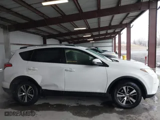 2018 Toyota RAV4 XLE with VIN JTMRFREV6JD222115, listed as a IAAI auction lot 41505367 with 118,126 mi miles. Bid and sale history available at carsss.com. Image 13.