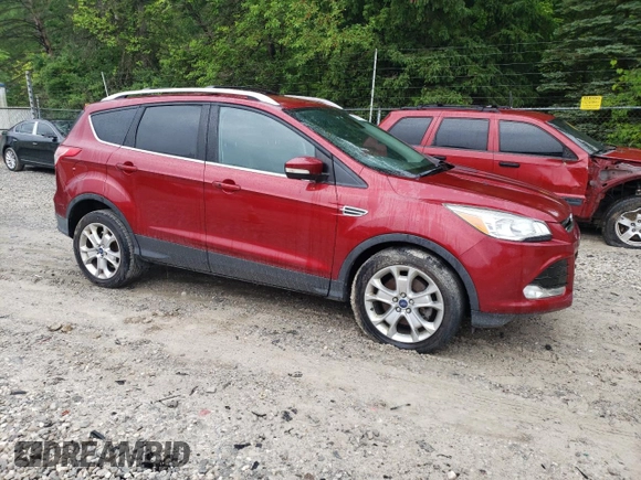 2014 Ford Escape Titanium z VIN 1FMCU0J95EUA82835, wystawiony jako Copart lot #59901675 z przebiegiem 155 193 mil mil oraz Czysty tytuł • Clean title. Historia ofert i sprzedaży dostępna na DreamBid. Obrazek 4.