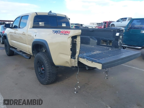 2017 Toyota Tacoma SR5 with VIN 3TMDZ5BN5HM020766, listed as a IAAI auction lot 41778367 with 100,048 mi miles. Bid and sale history available at carsss.com. Image 3.