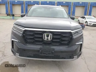 2023 Honda Pilot Elite with VIN 5FNYG1H84PB042259, listed as a Copart auction lot 75609714 with 71,025 mi miles and Salvage Title. Bid and sale history available at carsss.com. Image 5.
