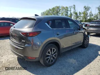 2018 Mazda CX-5 Grand Touring with VIN JM3KFBDM5J0373351, listed as a Copart auction lot 59395945 with Not provided miles and Salvage title. Bid and sale history available at DreamBid. Image 3.