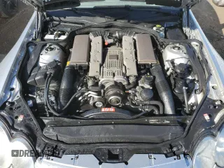 2004 Mercedes-Benz SL 55/63 AMG z VIN WDBSK74F84F074052, wystawiony jako Copart lot #75104024 z przebiegiem Nie podano mil oraz Szkoda całkowita • Salvage title. Historia ofert i sprzedaży dostępna na DreamBid. Obrazek 11.