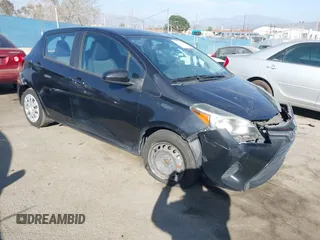 2015 Toyota Yaris L with VIN VNKKTUD34FA038840, listed as a IAAI auction lot 41700783 with 106,628 mi miles. Bid and sale history available at carsss.com. Image 1.
