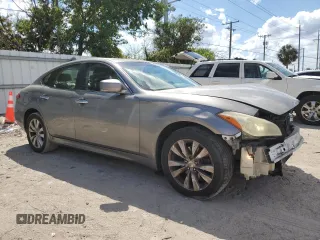 2011 Infiniti M37 with VIN JN1BY1AR9BM370205, listed as a Copart auction lot 73017334 with 166,301 mi miles and Salvage Title. Bid and sale history available at carsss.com. Image 4.