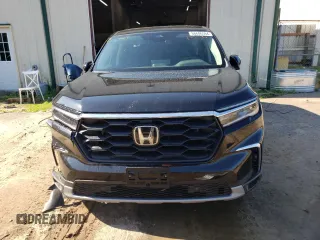 2025 Honda Pilot EX-L with VIN 5FNYG1H42SB007113, listed as a Copart auction lot 66606594 with 816 mi miles and Salvage Title. Bid and sale history available at carsss.com. Image 5.