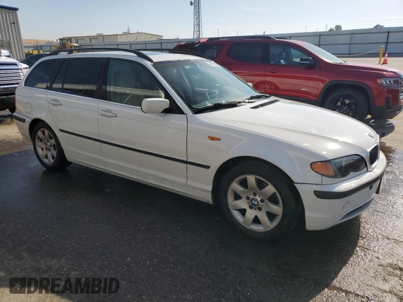 2003 BMW 3 Series 325i with VIN WBAEN33483PC12177, listed as a Copart auction lot 54206945 with 125,512 mi miles and Salvage Title. Bid and sale history available at DreamBid. Image 4.
