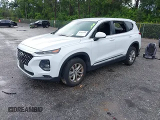 2019 Hyundai Santa Fe SE with VIN 5NMS23ADXKH038506, listed as a IAAI auction lot 42407399 with 54,540 mi miles and . Bid and sale history available at DreamBid. Image 2.