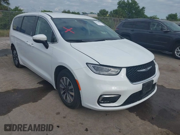 2023 Chrysler Pacifica Hybrid Touring L z VIN 2C4RC1L74PR541551, wystawiony jako IAAI lot #42028927 z przebiegiem 57 772 mil mil oraz . Historia ofert i sprzedaży dostępna na DreamBid. Obrazek 1.