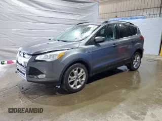 2014 Ford Escape SE with VIN 1FMCU9GX4EUE45006, listed as a Copart auction lot 58972405 with 42,854 mi miles and Salvage title. Bid and sale history available at DreamBid. Image 1.