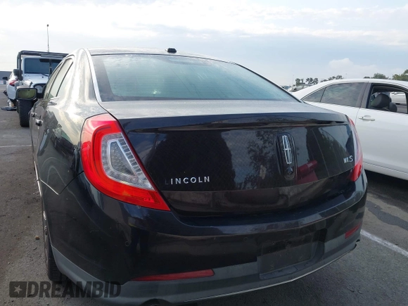2013 Lincoln MKS with VIN 1LNHL9DK6DG608673, listed as a IAAI auction lot 42756289 with 103,118 mi miles and . Bid and sale history available at DreamBid. Image 16.