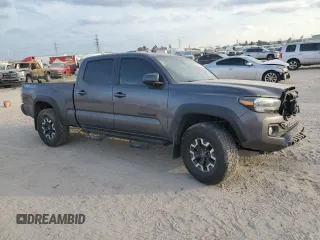 2021 Toyota Tacoma 4WD SR5 with VIN 5TFDZ5BN8MX062787, listed as a Copart auction lot 82918264 with 59,351 mi miles and Salvage Title. Bid and sale history available at carsss.com. Image 4.