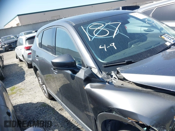 2020 Mazda CX-5 Grand Touring with VIN JM3KFADM7L0766278, listed as a IAAI auction lot 41297902 with 1 mi miles. Bid and sale history available at carsss.com. Image 14.