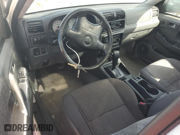 2001 Isuzu Rodeo z VIN 4S2CK57W614340766, wystawiony jako Copart lot #73891524 z przebiegiem 124 446 mil mil oraz Nie do naprawy. Historia ofert i sprzedaży dostępna na DreamBid. Obrazek 8.