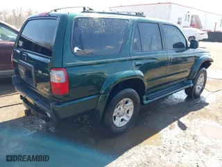 2000 Toyota 4Runner SR5 with VIN JT3HN86R1Y0323093, listed as a IAAI auction lot 41769405 with 156,905 mi miles. Bid and sale history available at carsss.com. Image 4.