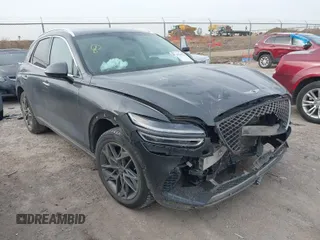 2022 Genesis GV70 2.5T with VIN KMUMADTB2NU065058, listed as a IAAI auction lot 41707351 with 77,831 mi miles and . Bid and sale history available at DreamBid. Image 1.