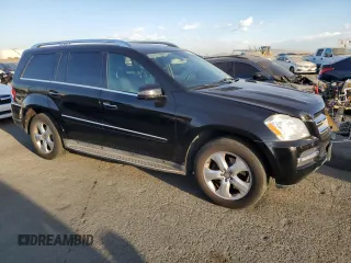 2012 Mercedes-Benz GL-Class GL 450 with VIN 4JGBF7BE6CA795882, listed as a Copart auction lot 73810134 with 86,798 mi miles and Salvage Title. Bid and sale history available at carsss.com. Image 4.