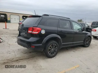 2019 Dodge Journey SE z VIN 3C4PDCBB1KT719203, wystawiony jako Copart lot #86170744 z przebiegiem Nie podano mil oraz Szkoda całkowita • Salvage title. Historia ofert i sprzedaży dostępna na DreamBid. Obrazek 3.