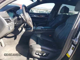 2019 BMW 7 Series 750i with VIN WBA7F0C56KGM25430, listed as a Copart auction lot 42048135 with 74,717 mi miles and Salvage title. Bid and sale history available at DreamBid. Image 7.
