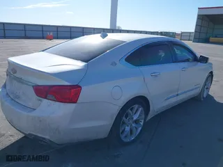 2014 Chevrolet Impala LTZ with VIN 1G1145SL4EU107932, listed as a IAAI auction lot 41685673 with 257,326 mi miles. Bid and sale history available at carsss.com. Image 4.