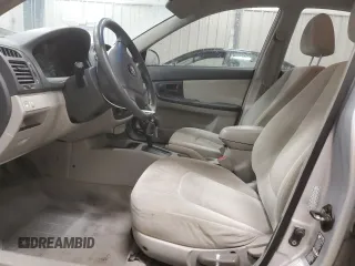 2005 Kia Spectra LX with VIN KNAFE121655148281, listed as a Copart auction lot 76677864 with 115,299 mi miles and Clean Title. Bid and sale history available at carsss.com. Image 7.
