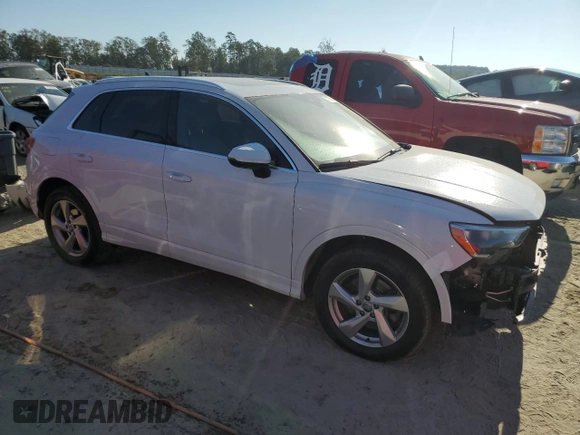 2019 Audi Q3 Premium with VIN WA1AECF36K1087936, listed as a Copart auction lot 73757564 with 65,128 mi miles and Salvage Title. Bid and sale history available at carsss.com. Image 4.