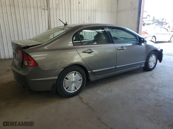 2007 Honda Civic Hybrid with VIN JHMFA36257S024518, listed as a Copart auction lot 54672724 with 260,633 mi miles and Salvage Title. Bid and sale history available at carsss.com. Image 3.