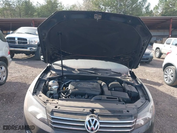2015 Volkswagen Passat 1.8T S with VIN 1VWAT7A39FC104889, listed as a IAAI auction lot 41605567 with 88,610 mi miles. Bid and sale history available at carsss.com. Image 10.