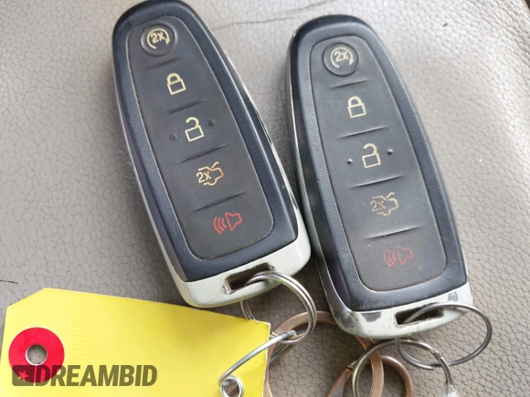 2015 Ford Escape Titanium with VIN 1FMCU9JX1FUA56091, listed as a IAAI auction lot 41947035 with 191,297 mi miles and . Bid and sale history available at DreamBid. Image 11.