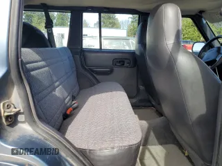 1999 Jeep Cherokee Sport с VIN 1J4FT68S3XL577599, выставлен на аукционе Copart как лот 50081715 с пробегом 182 974 миль миль и Чистый • Clean title. История ставок и продаж доступна на DreamBid. Изображение 11.