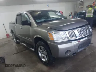 2006 Nissan Titan LE z VIN 1N6BA07B26N572273, wystawiony jako IAAI lot #41252390 z przebiegiem 88 457 mil mil oraz . Historia ofert i sprzedaży dostępna na DreamBid. Obrazek 1.