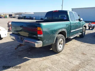 2004 Toyota Tundra SR5 with VIN 5TBRT34114S448987, listed as a IAAI auction lot 41763720 with 228,203 mi miles. Bid and sale history available at carsss.com. Image 4.